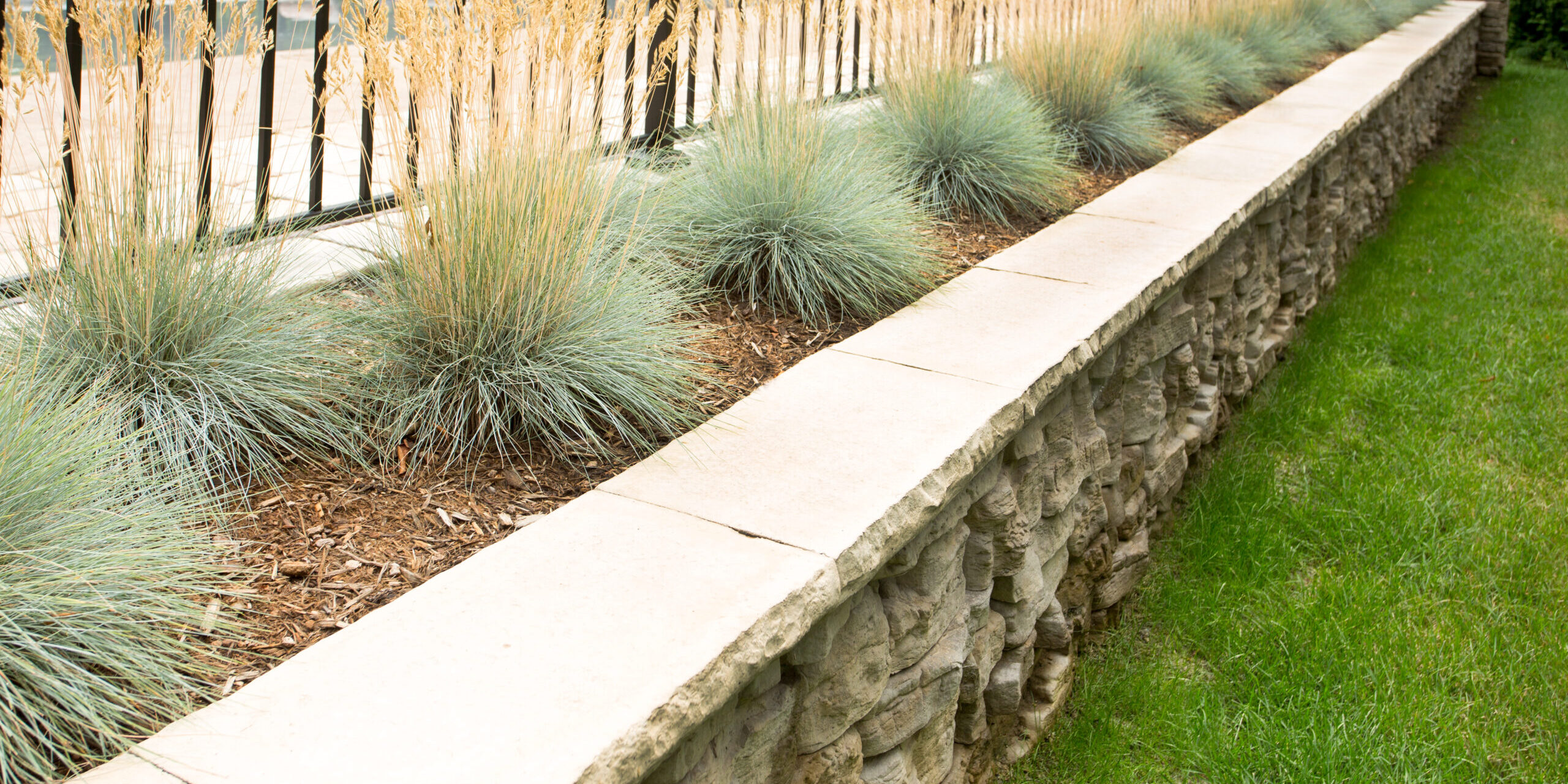 Give your rustic Belvedere garden wall a clean look with Dimensional Coping.