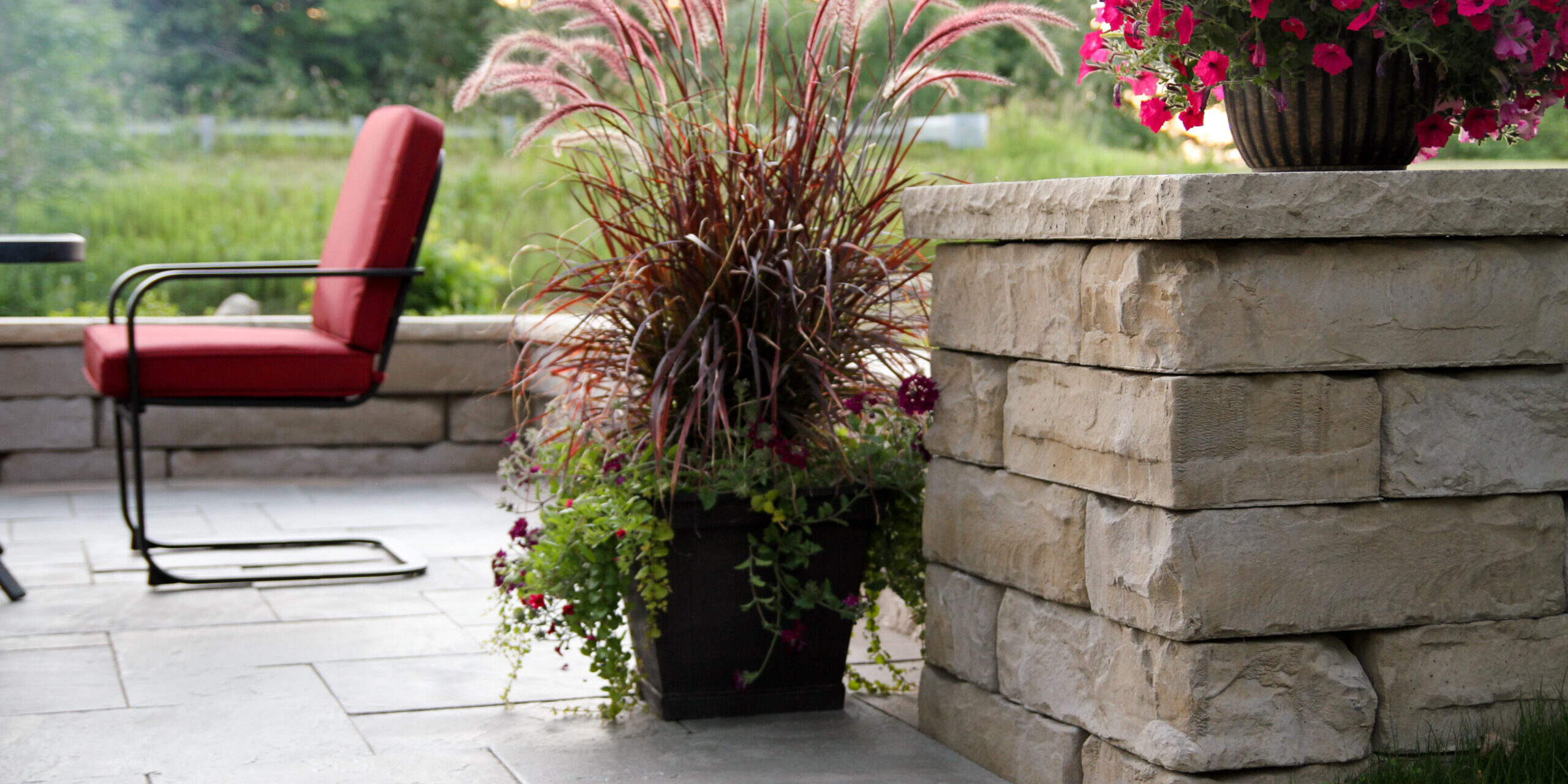 Rosetta_MDC_Display_PreplannedPatioDesign_Formal_Kodah_FondDuLac_DimFlag_Bluestone_DimCoping_Sand_7
